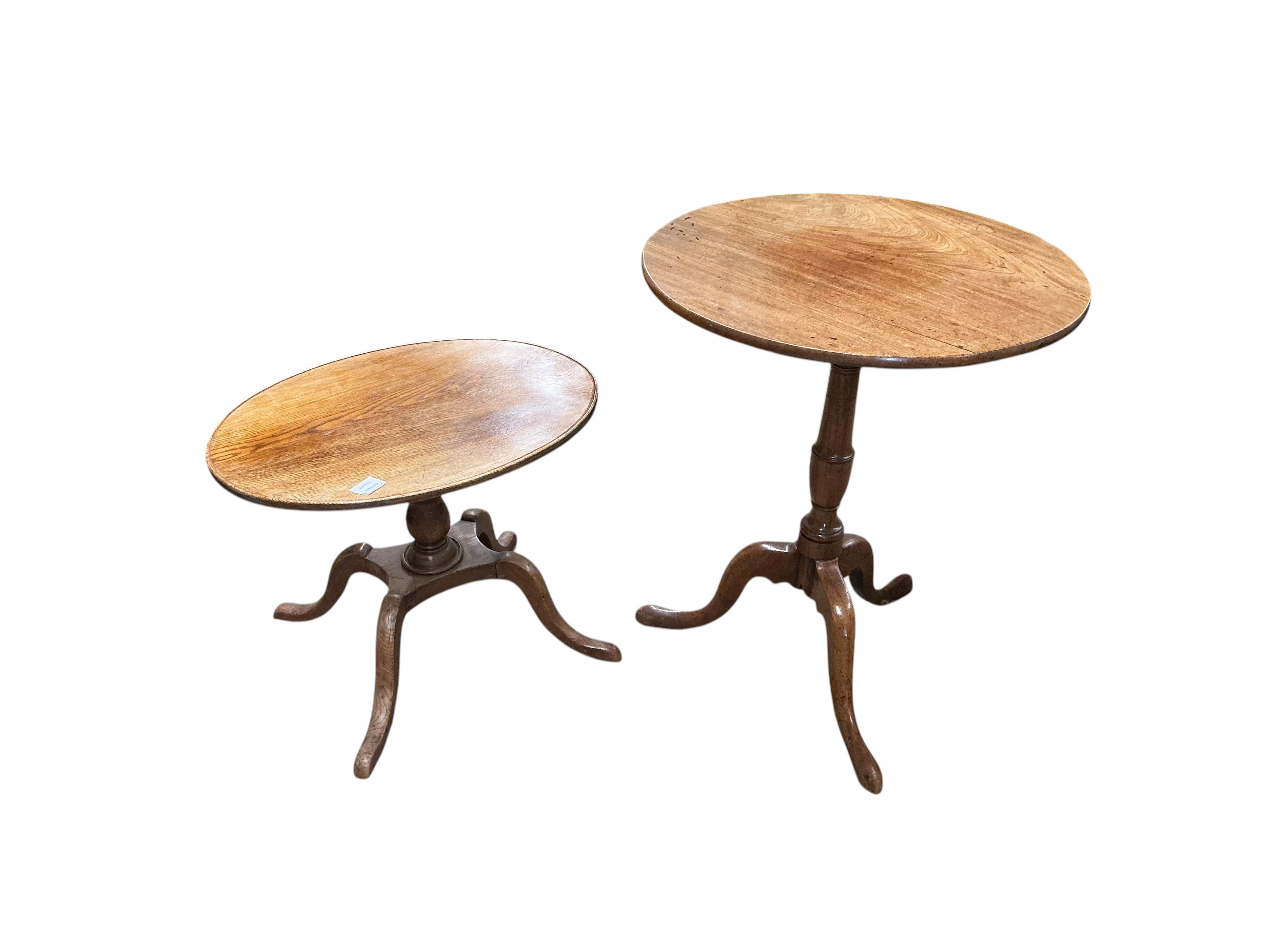 An early 19th century circular mahogany tilt top tripod tea table, diameter 59cm, height 71cm, together with an oak oval occasional table, adapted